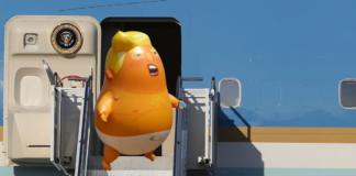 Baby Trump Blimp Descending Air Force One by T.J. Hawk via Flickr (CC BY-SA 2.0)